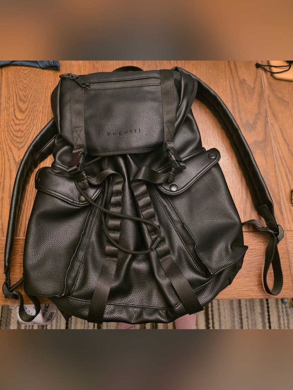 Bugatti Black Pebbled Faux Leather Drawstring Laptop Backpack